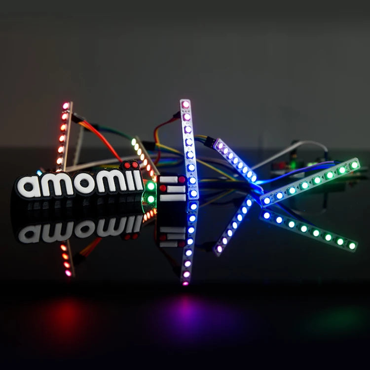 amomii Glow RGB LED strips lit in multiple colours in a dark setting, showing programmable light patterns